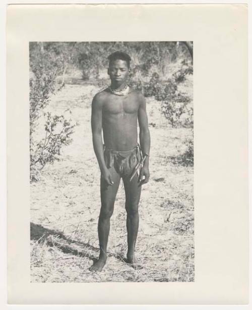 "1950 '400 Series' / 87 B/W prints (some duplicates) / Ovamboland": Man standing (print is a cropped image)