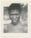 "1950 '400 Series' / 87 B/W prints (some duplicates) / Ovamboland": Man, portrait (print is a cropped image)