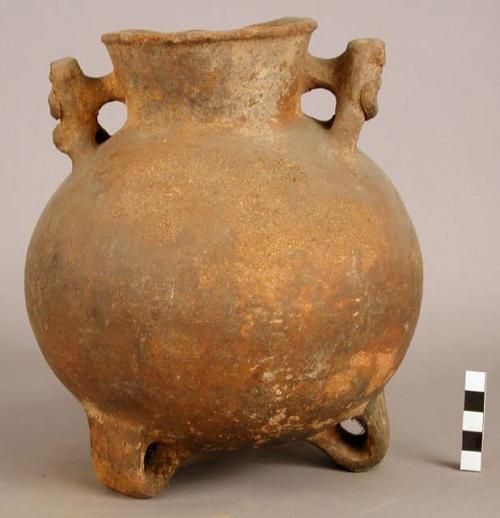 Red ware vessel - three legs, slightly flaring rim, human effigy handles