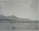 "1950 400 series  43 prints / Kunene River, Kaokoveld, Ovamboland / Merle LaVoy & L.K.M": Landscape, with mountains in background (print is a cropped image)