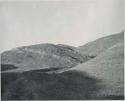 "1950 400 series  43 prints / Kunene River, Kaokoveld, Ovamboland / Merle LaVoy & L.K.M": View of hills, showing tipped strata (print is a cropped image)