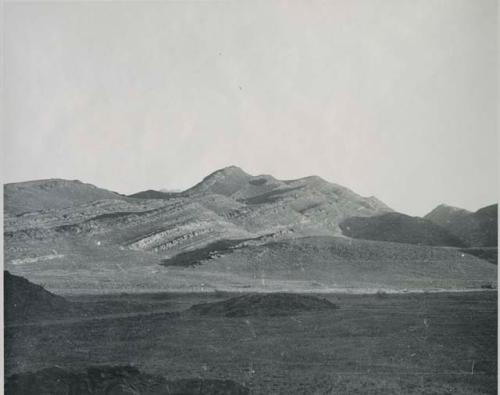 "1950 400 series  43 prints / Kunene River, Kaokoveld, Ovamboland / Merle LaVoy & L.K.M": View of hills, showing tipped strata (print is a cropped image)