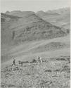 "1950 400 series  43 prints / Kunene River, Kaokoveld, Ovamboland / Merle LaVoy & L.K.M": Men looking for tin (print is a cropped image)