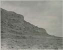 "1950 400 series  43 prints / Kunene River, Kaokoveld, Ovamboland / Merle LaVoy & L.K.M":  Hillside with vegetation (print is a cropped image)