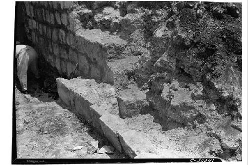 Caracol.N. side of stairway showing how balustrade was built against wall facing