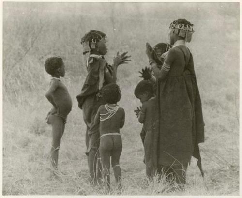 [No folder title]: Group of girls and children dancing (print is a cropped image)