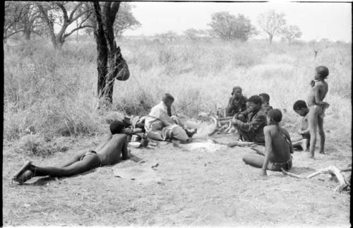 "/Qui Hunter" and other Ju/'hoansi, seen from a distance