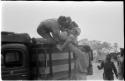 William Donnellan and Casper Kruger lifting "/Qui Hunter" into the truck
