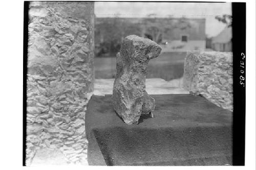 Ancient 3-legged metate - from W. side of stairway of Monjas #4.