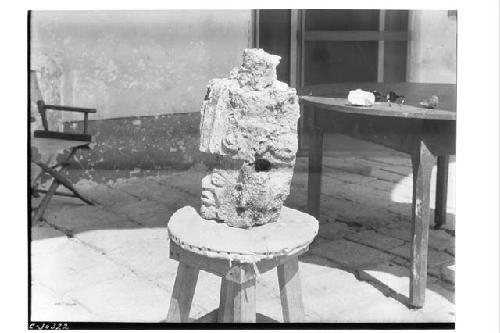 Side view of stucco head at Coba