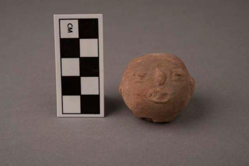 Pottery head - Archaic type