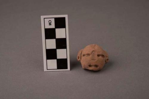 Pottery head - Archaic type