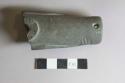 Ground stone, pipe stem fragment, carved, engraved, perforated rim