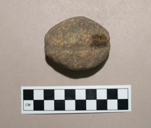 Round, grooved, pecked stone club head or sinker