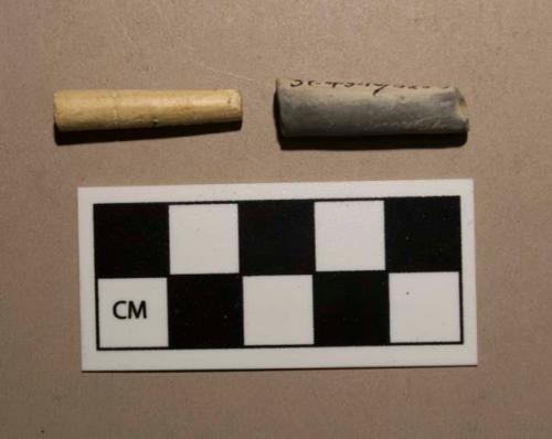 Fragmentary clay pipe stems 5/64 and 6/64