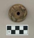 Ceramic spindle whorl, incised design