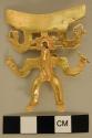 Gold zoomorphic male figure with large serpent/winged headdress. Loop on back.