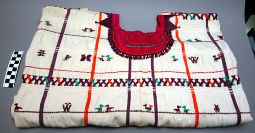 Woman's blouse (huipil) - white, with orange, red, purple & green stripes and em