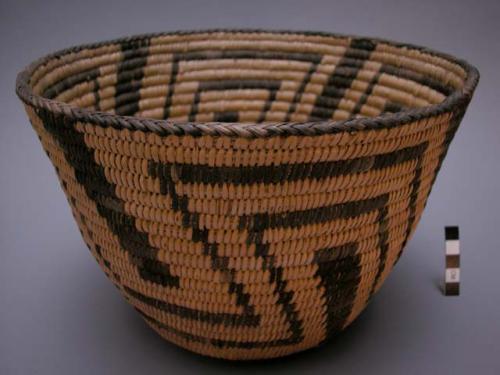 Basket bowl, coiled. Made of bear grass, yucca, and devil's claw. Geometric