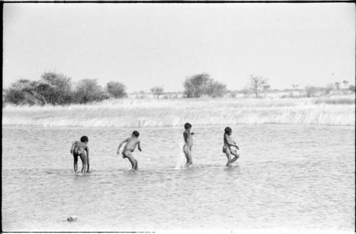 Boys playing in the water