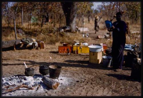 Kitchen at the expedition camp, with John Nambahu standing in the background