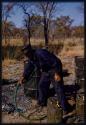 Paulus grabbing a water or gasoline hose