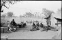 People lying in front of one of the expedition's tents