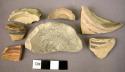 7 potsherds - bases with painted bands