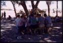 People sitting at a table eating lunch