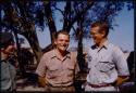 Father Jean Marie Molier standing with Nicholas England