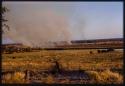 View of brush fire across the Cuito River