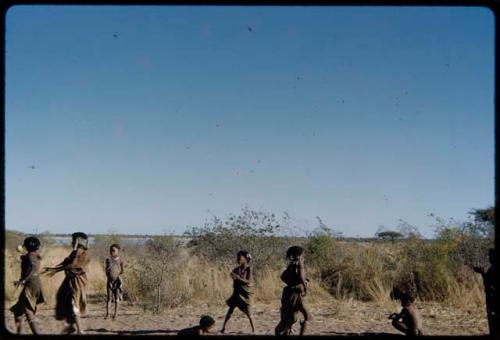 Children, Groups, play: Children playing a game in a dance circle area