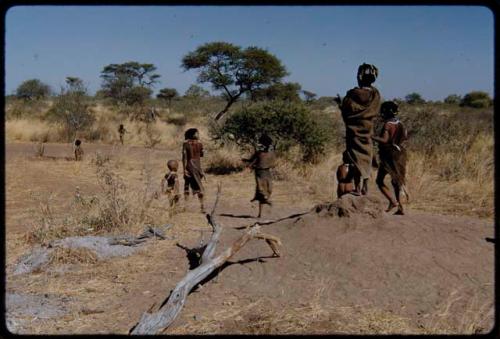 Children, Groups, play: Girls playing Tamah n!o’an (the ball game) at an anthill