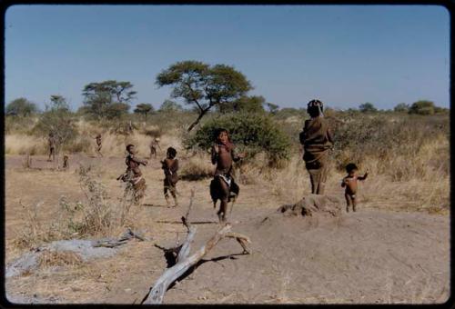 Children, Groups, play: Girls playing Tamah n!o’an (the ball game) at an anthill