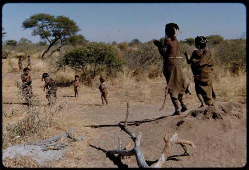 Children, Groups, play: Girls playing Tamah n!o’an (the ball game) at an anthill