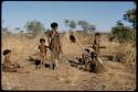 Children, Imitation: Girls placing branches to build little skerms