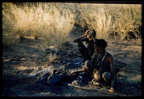 Food, Cooking: "/Old Gasa" cooking the head of an animal in a pit