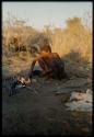 Food, Cooking: "Old Gau" cooking at his fire in the afternoon