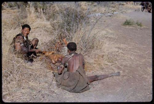 Food, Meat: Two women preparing an animal stomach