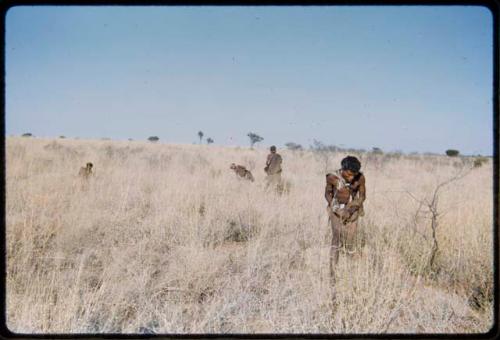 Food Gathering, Tsi: Group of people gathering tsi