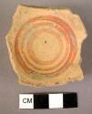 Pottery base - Mycenaean - red paint band at base - concentric circles in interi