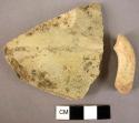 Potsherd; handle fragment - red painted traces on white slip