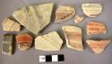 17 potsherds with bands