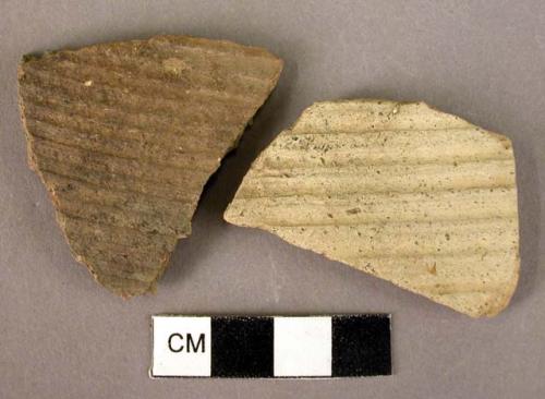 2 potsherds, plain ware, corrugated surface