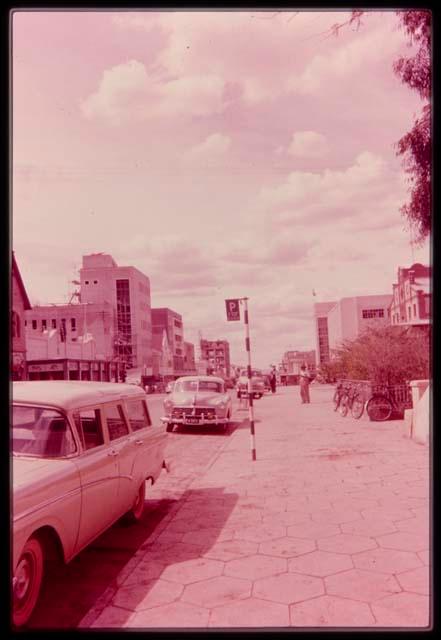 Street view with cars and buildings