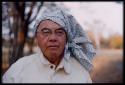 Laurence Marshall wearing head kerchief