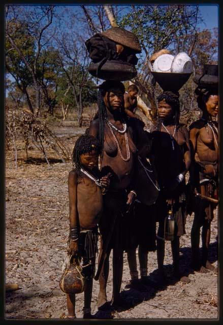 Group of people standing in a line