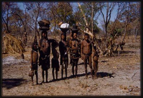 Group of people standing in a line