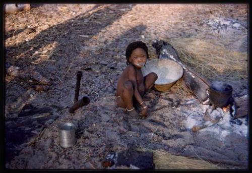 Child sitting and eating meal