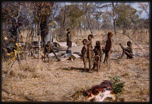 Children standing together, seen from a distance